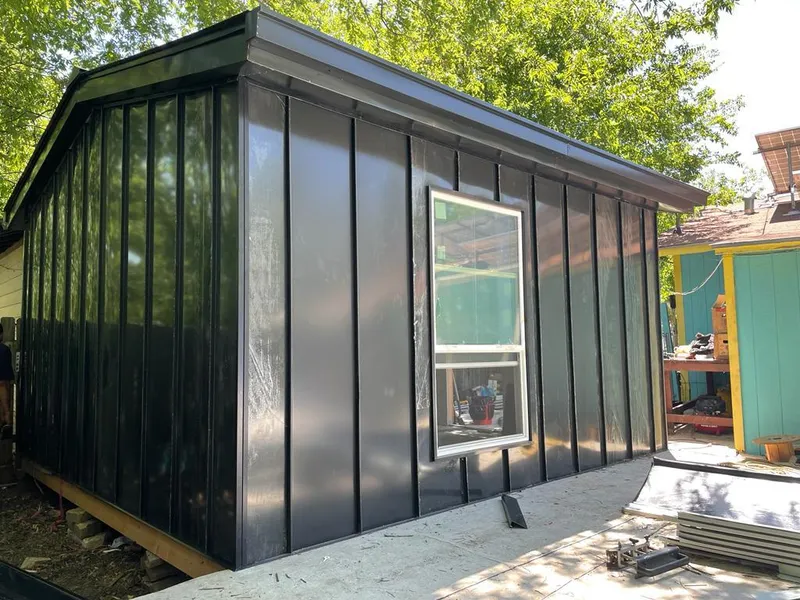 Black standing seam metal wall panels for Metal Roof Installation in Gridley