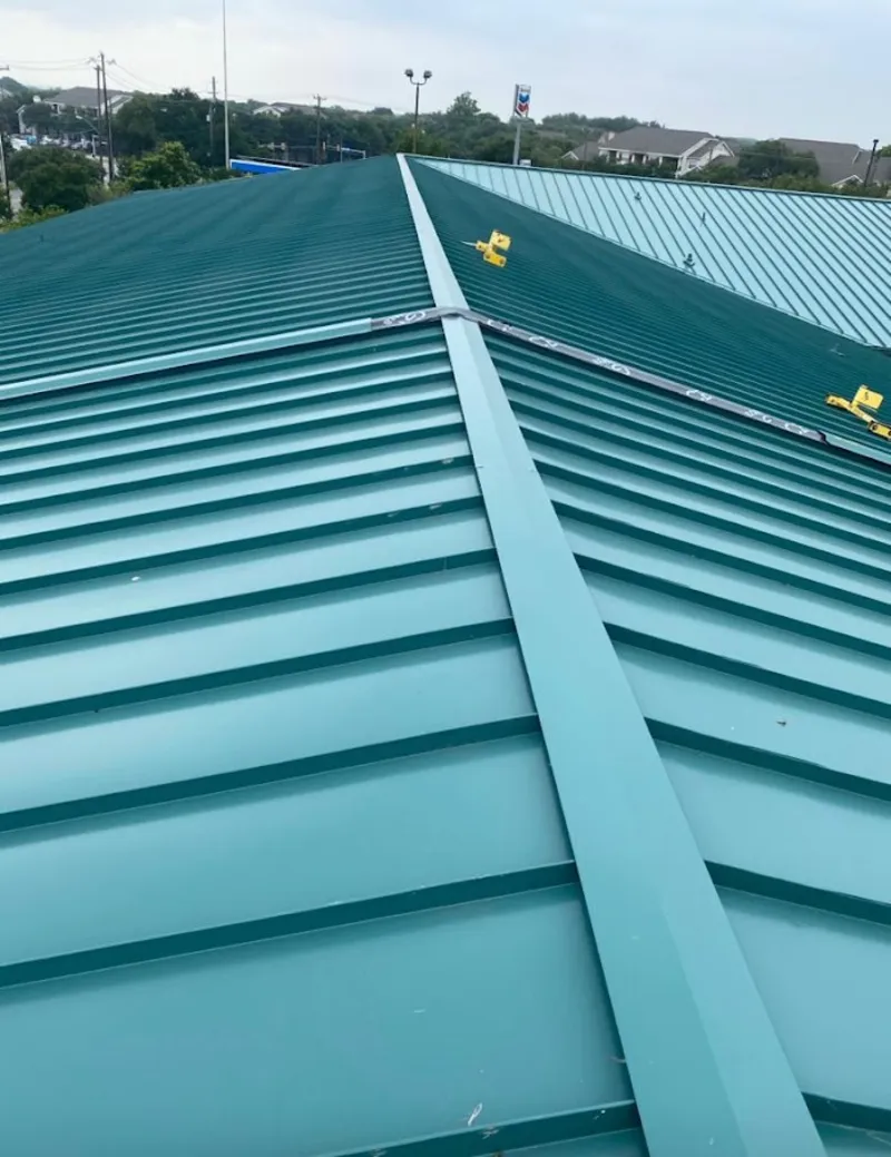 Green commercial metal roof ridge and valley for Metal Roof Repair in Gridley
