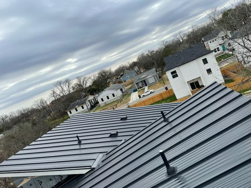 Standing seam metal roof panels with vents for Skylight Repair in Gridley